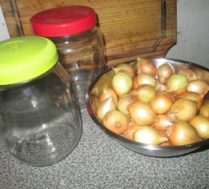 Onions and jars ready for pickling